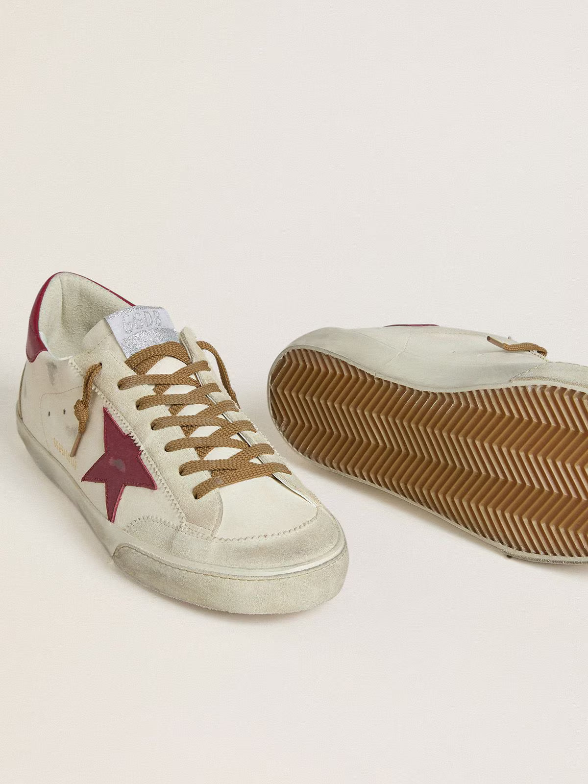 Golden Goose Super-Star with red leather star and beige suede inserts